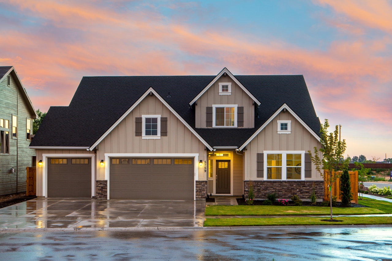 brown-and-gray-painted-house-in-front-of